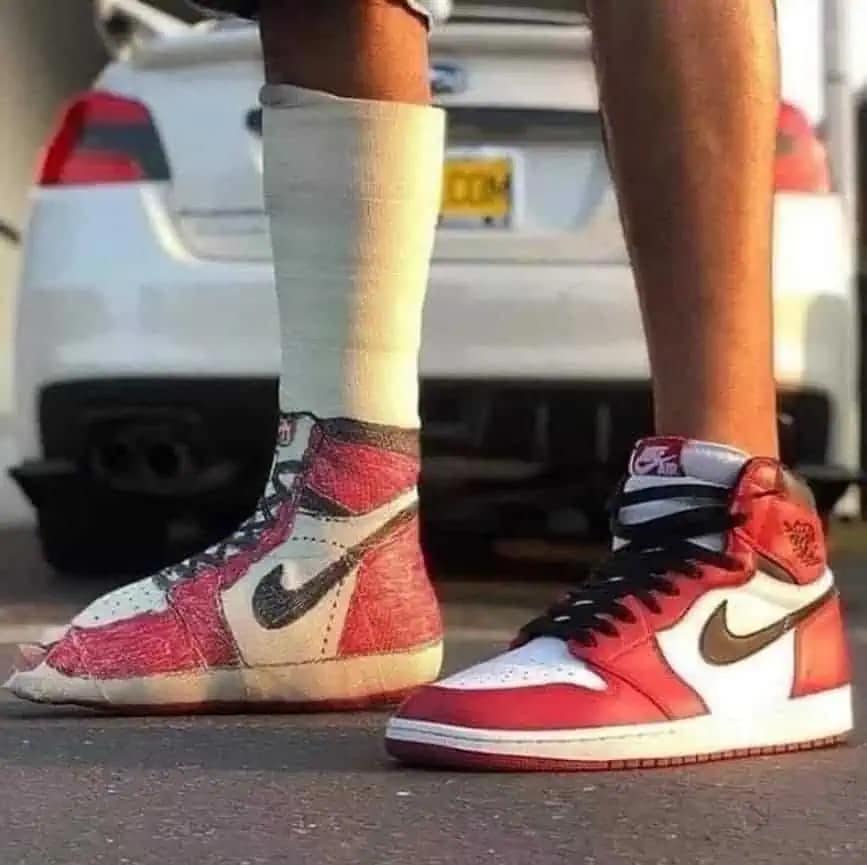 A hilarious meme showing a "budget" fashion hack where a person wears a real Nike Air Jordan 1 on their right foot and a white tube sock meticulously hand-colored with markers to perfectly mimic the shoe on their left.