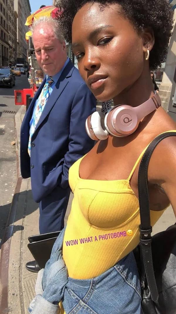 chaotic "caught in 4K" meme dump entry showing a young woman taking a confident street selfie while an older man in a blue suit directly behind her is caught leaning in to stare down her top with an unmistakable, wide-eyed expression.