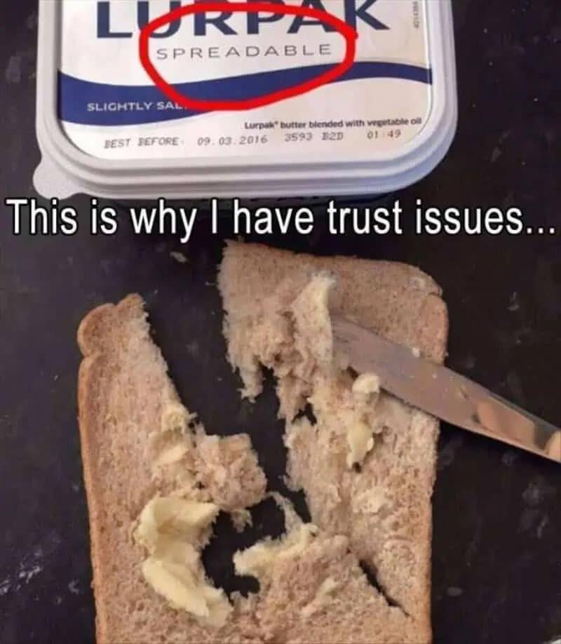relatable kitchen nightmare entry for this meme dump. The top half shows a tub of Lurpak "Spreadable" butter, while the bottom half shows a slice of bread absolutely decimated and torn apart by a knife trying to spread said butter. The caption simply states: "This is why I have trust issues..."