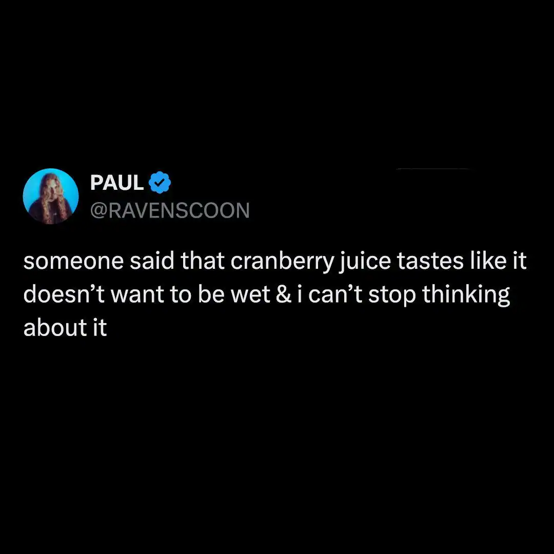 A dark background with white text stating cranberry juice tastes like it doesn’t want to be wet.