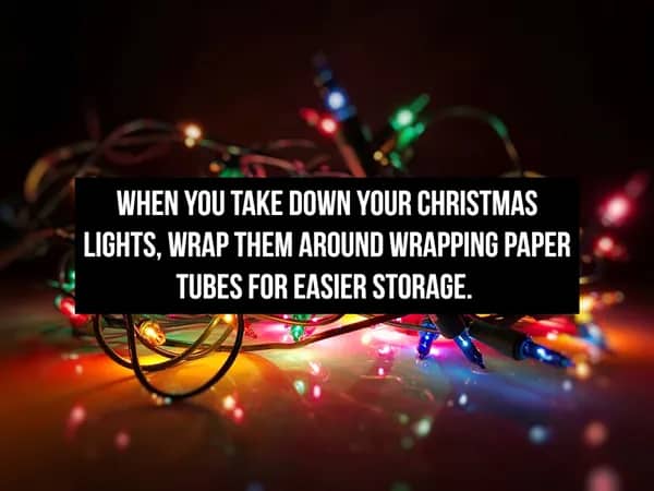 Glowing colorful Christmas lights with text about wrapping them around paper tubes for organized storage.