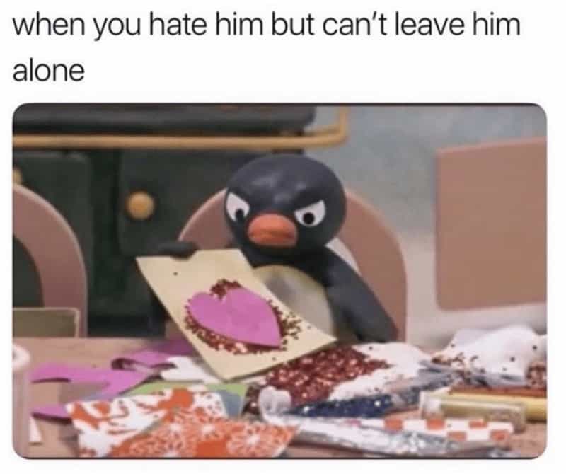 relatable relationship meme using a scene from the claymation show Pingu. It shows the character Pingu looking intensely angry while meticulously crafting a glittery pink heart card. The caption reads: "when you hate him but can't leave him alone."