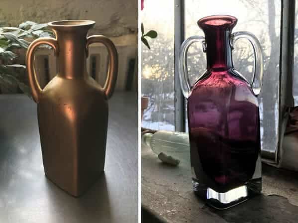 A metallic gold painted glass jug restored to reveal a deep purple translucent glass body.
