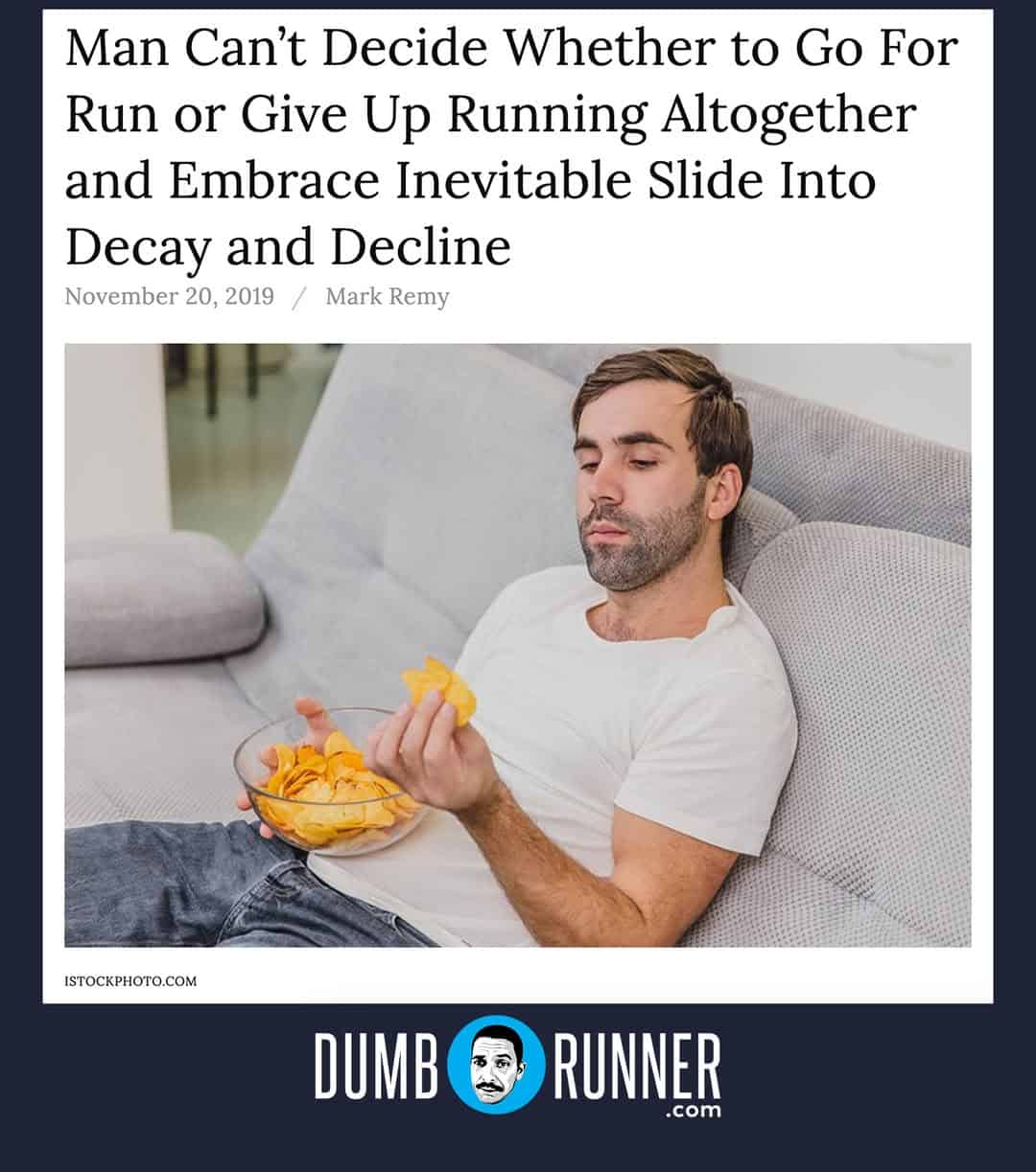 Man sitting on a couch eating chips while deciding between a run or embracing physical decay.