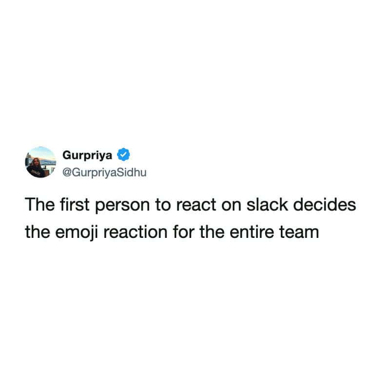 relatable slack meme tweet from @GurpriyaSidhu about corporate group-think, observing how the first person to react to a message effectively decides the "official" emoji reaction for the rest of the team.