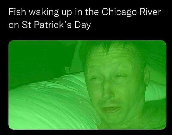 A neon green-filtered photo of a dazed man waking up in bed perfectly illustrates the confusion of a fish in the Chicago River on March 17th in this clever irish meme.