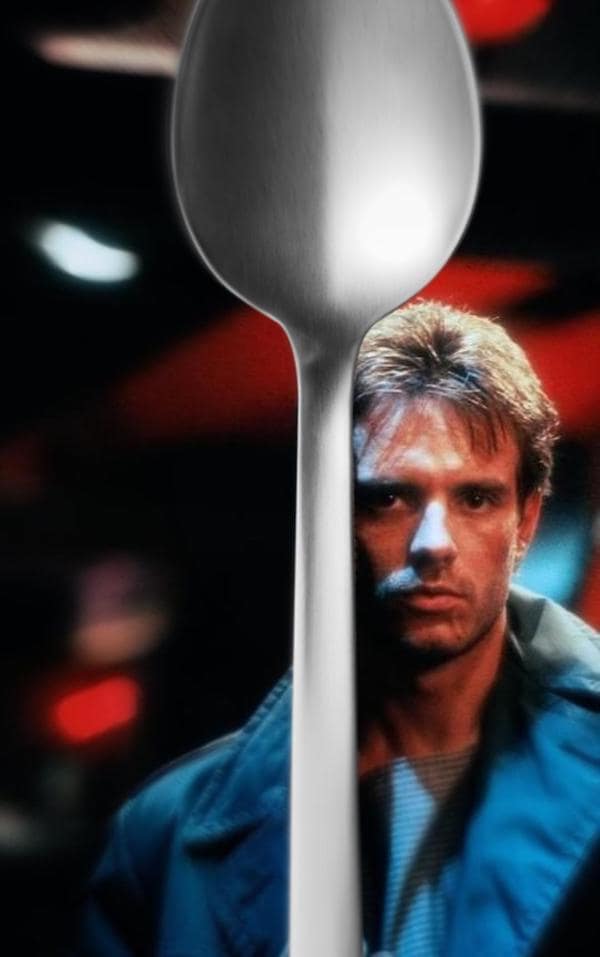 A surreal humor entry from this Terminator meme set showing Kyle Reese from the original film, but with a massive, vertically oriented kitchen spoon photoshopped over half his face, obscuring his eye.