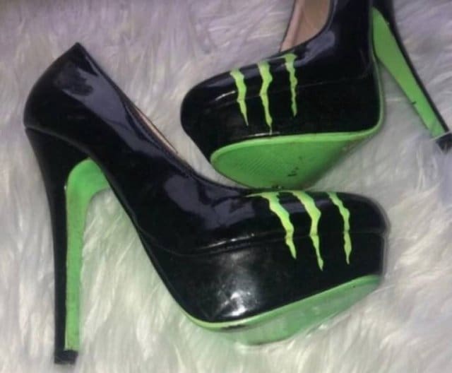 The ultimate "Kyle" accessory: black patent leather platform high heels emblazoned with the neon green Monster Energy claw logo and matching green soles.