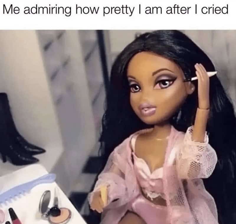 A glamorous Bratz doll pausing to admire how pretty she looks right after crying in a hilarious women meme that acts as an emotional staple for highly relatable memes for women.
