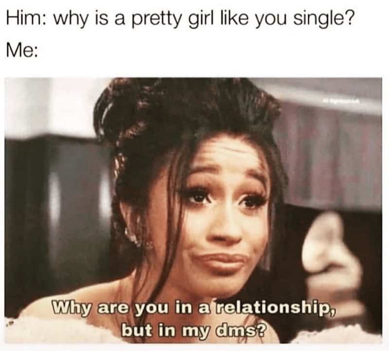 Cardi B looking smug in a women meme where a guy asks why she is single, and she aggressively counters by asking why he is in her DMs while in a relationship, a brutally honest post in memes for women.