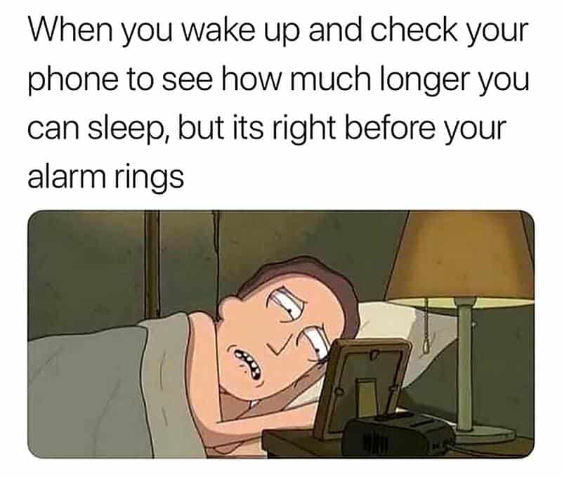 essed Morty from Rick and Morty stares in horror at his alarm clock in this funny work meme, capturing the pain of waking up just seconds before your alarm is set to ring.