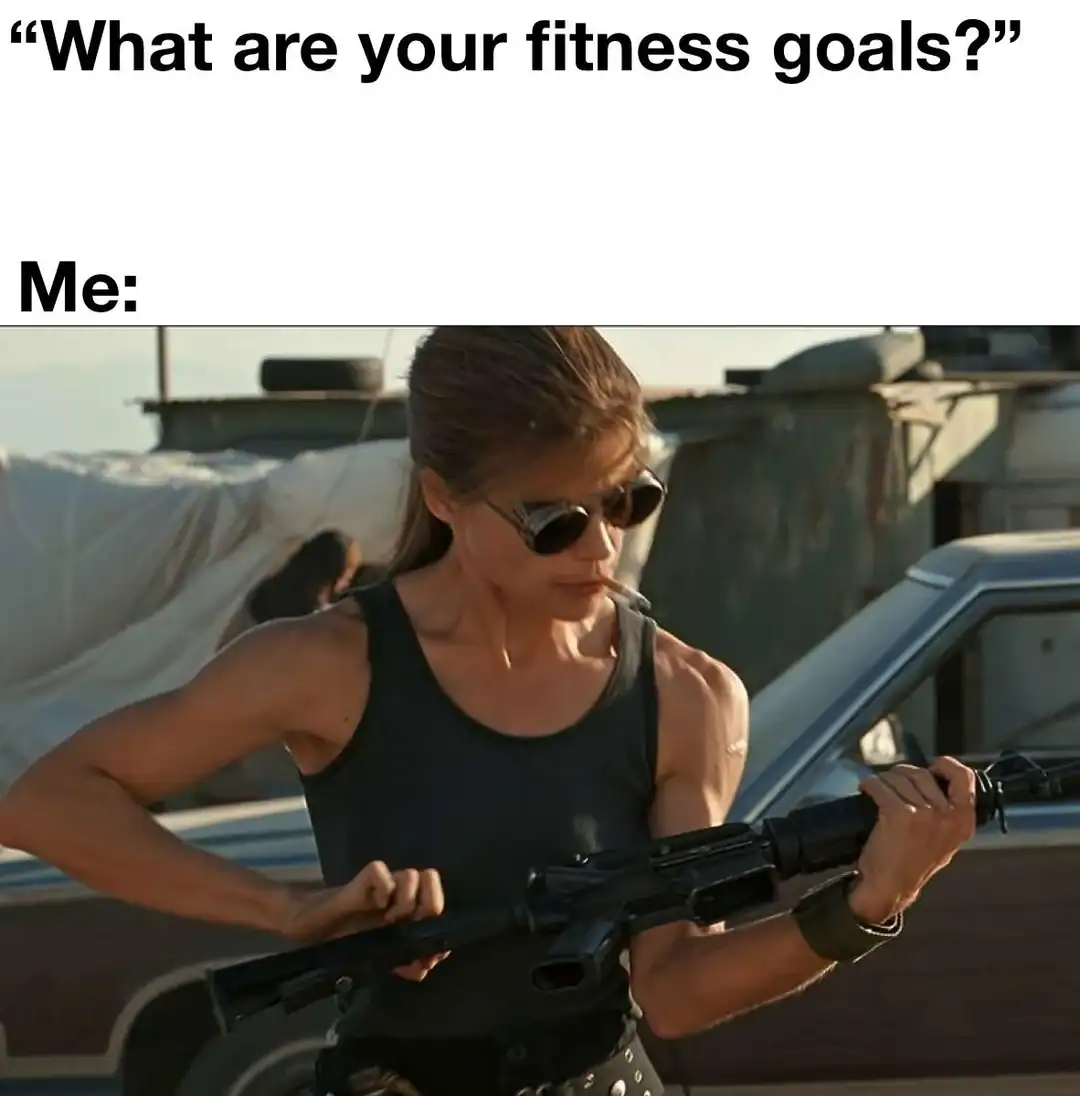 relatable workout meme expressing ultimate fitness goals using a picture of Sarah Connor from Terminator 2 looking absolutely badass with sunglasses and a rifle, making it a top-tier gym meme.
