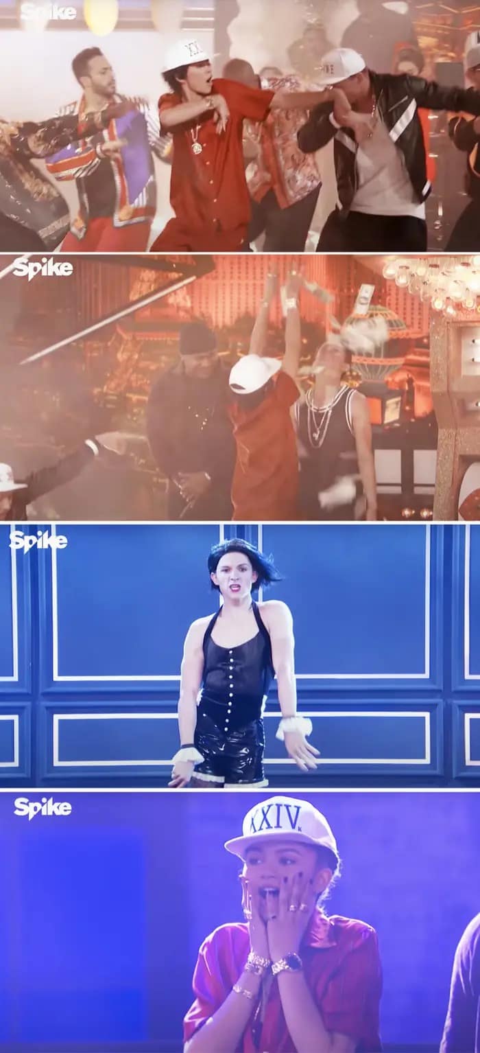 A legendary Zendaya and Tom Holland meme capturing their iconic Lip Sync Battle, showing Tom flawlessly performing Umbrella in full costume while Zendaya watches in absolute shock.