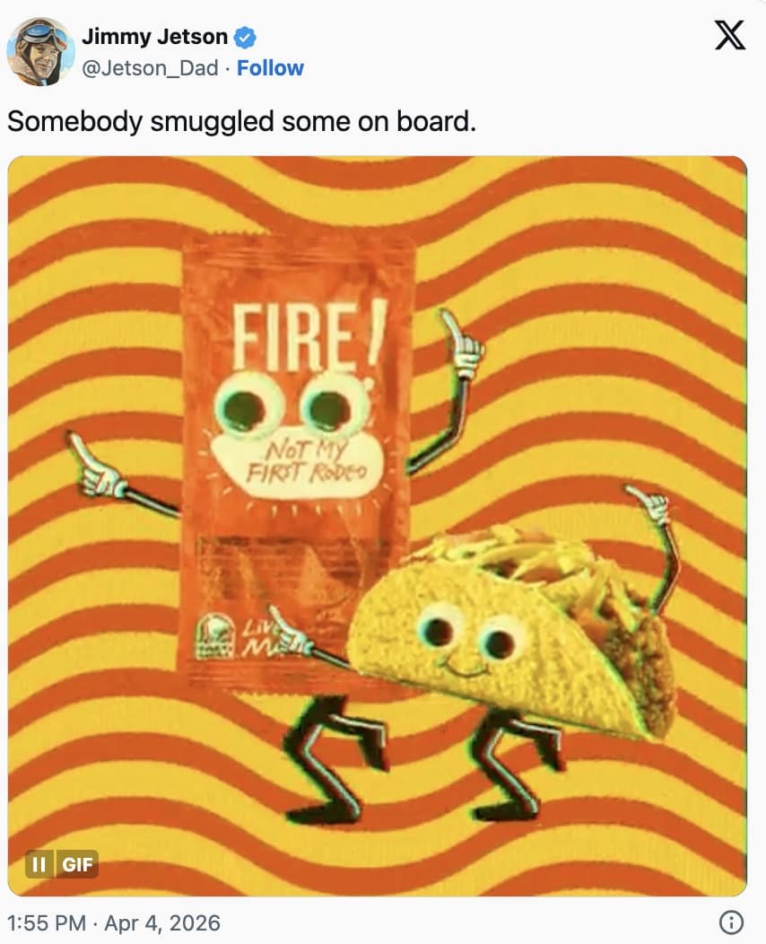 An artemis ii meme featuring a dancing Taco Bell "Fire!" sauce packet and a smiling taco with googly eyes. The caption, "Somebody smuggled some on board," jokingly suggests the mission's "bathroom trouble" was caused by unauthorized zero-gravity spicy food.