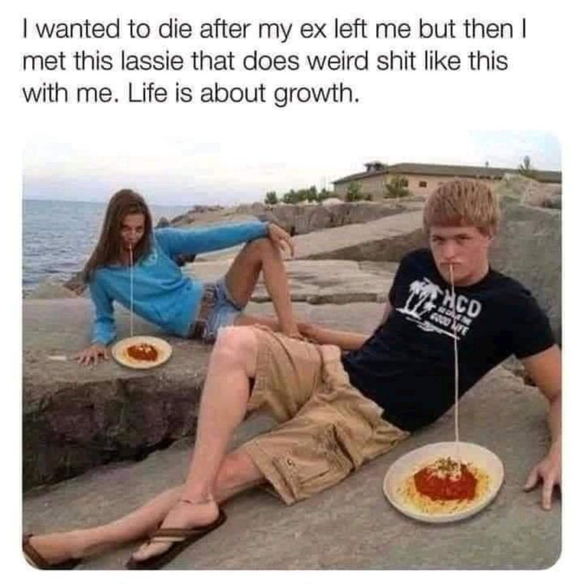 A "growth" best memes photo of a girl and boy sitting on rocks by the ocean, each slurping a single extremely long strand of spaghetti from plates on the ground, captioned as "weird shit" couples do together.