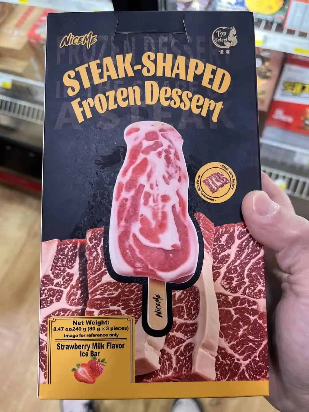 Product packaging for a steak-shaped frozen dessert that is actually strawberry milk flavored ice cream.
