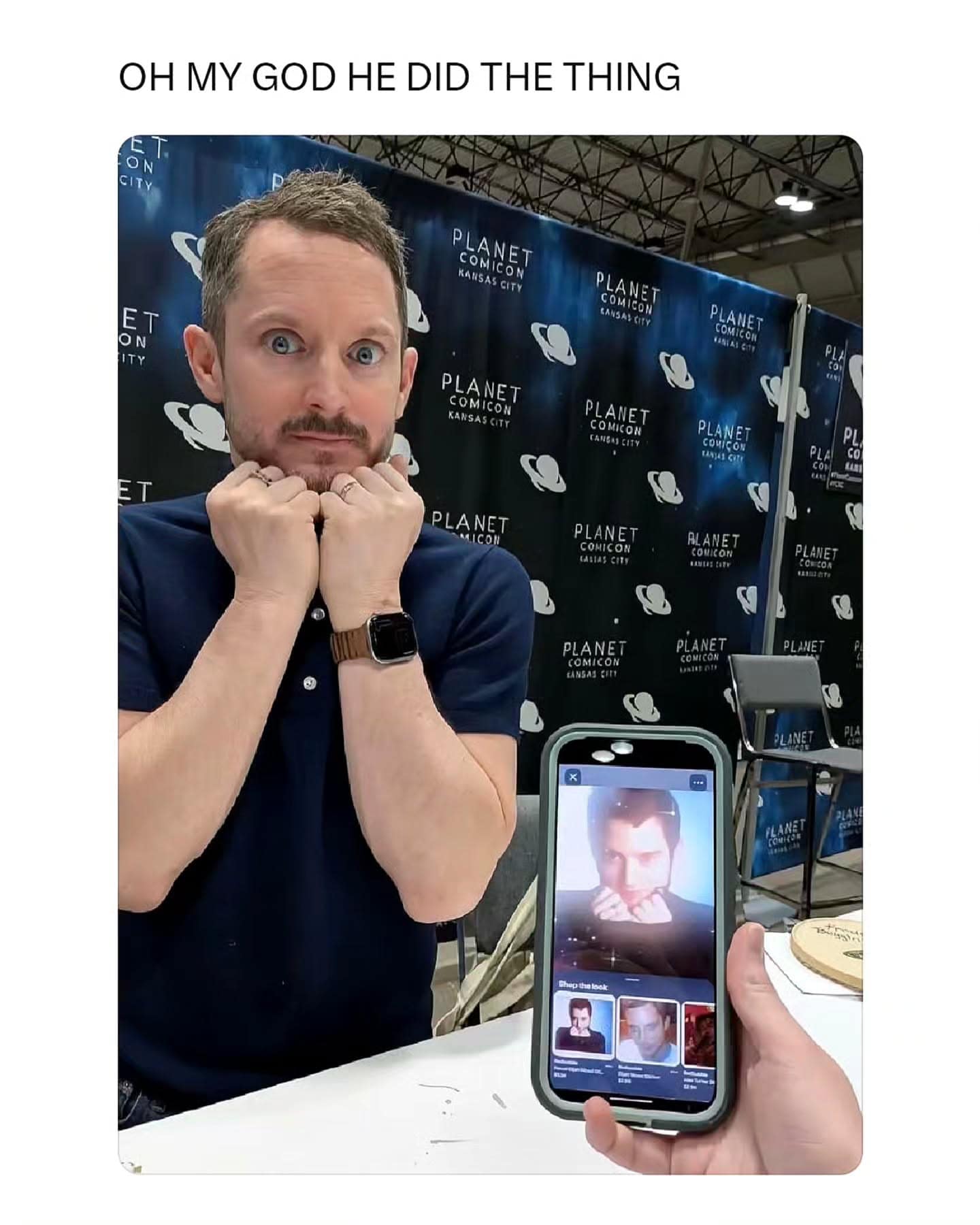A meta hilarious meme showing Elijah Wood at Planet Comicon holding his hands to his face to perfectly recreate a specific viral fan pose shown on a smartphone in the foreground.