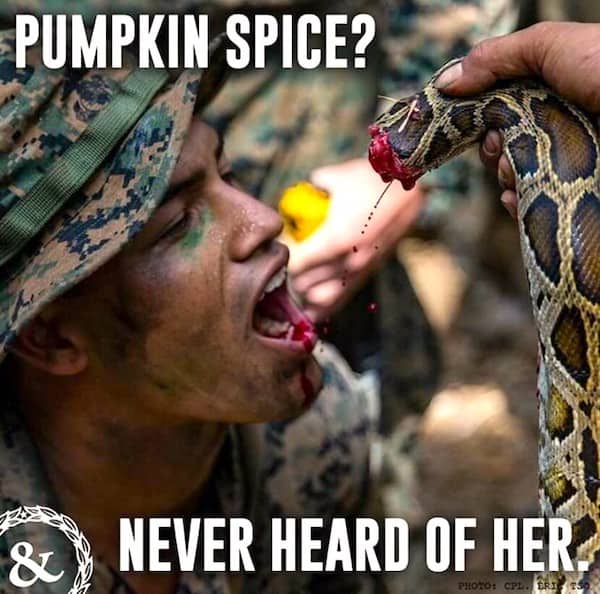 Marine drinking blood from a snake during survival training captioned "Pumpkin spice? Never heard of her"