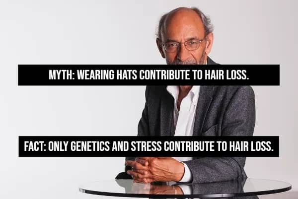 Bald older man seated myth vs fact only genetics and stress cause hair loss not hats