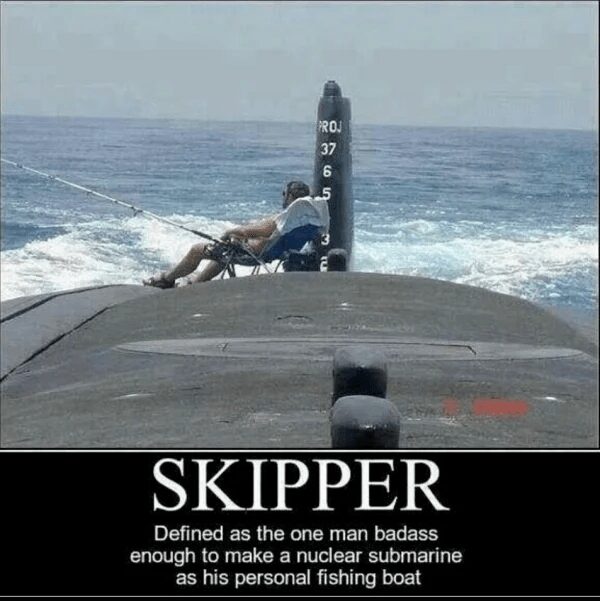 legendary submarine meme showing a sailor relaxing in a lawn chair on the deck of a surfaced nuclear submarine while holding a fishing rod. The text defines "SKIPPER" as the one man badass enough to use a nuclear sub as a personal fishing boat.