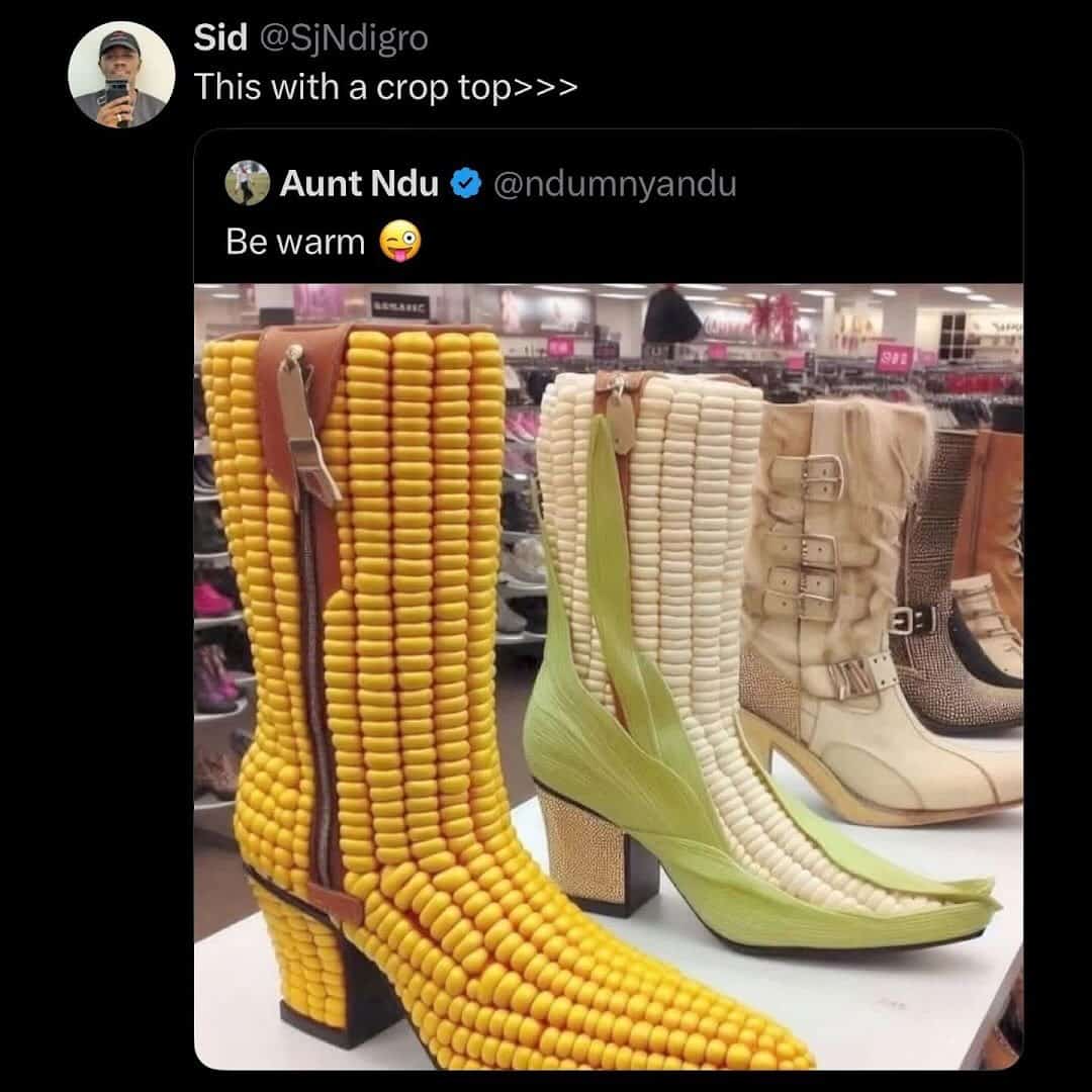 photo of surreal weird fashion footwear: high-heeled boots designed to look exactly like ears of corn. The yellow section is textured with individual kernels, while the green husks wrap around the heel and toe.
