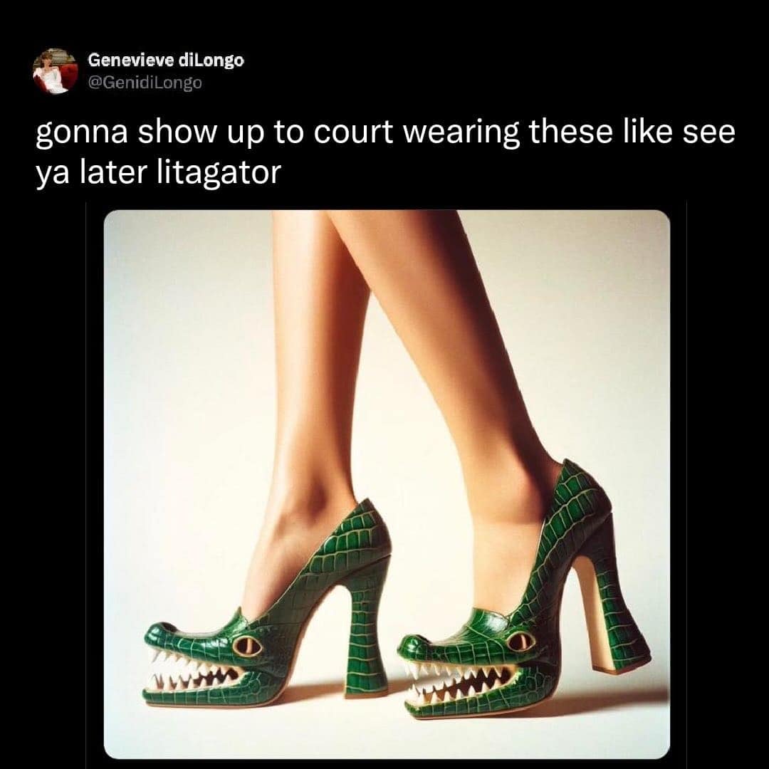 high-fashion shot of weird fashion pumps. The scaly green heels are shaped like an alligator’s head, with the open "mouth" exposing a row of sharp white teeth at the front of the shoe.