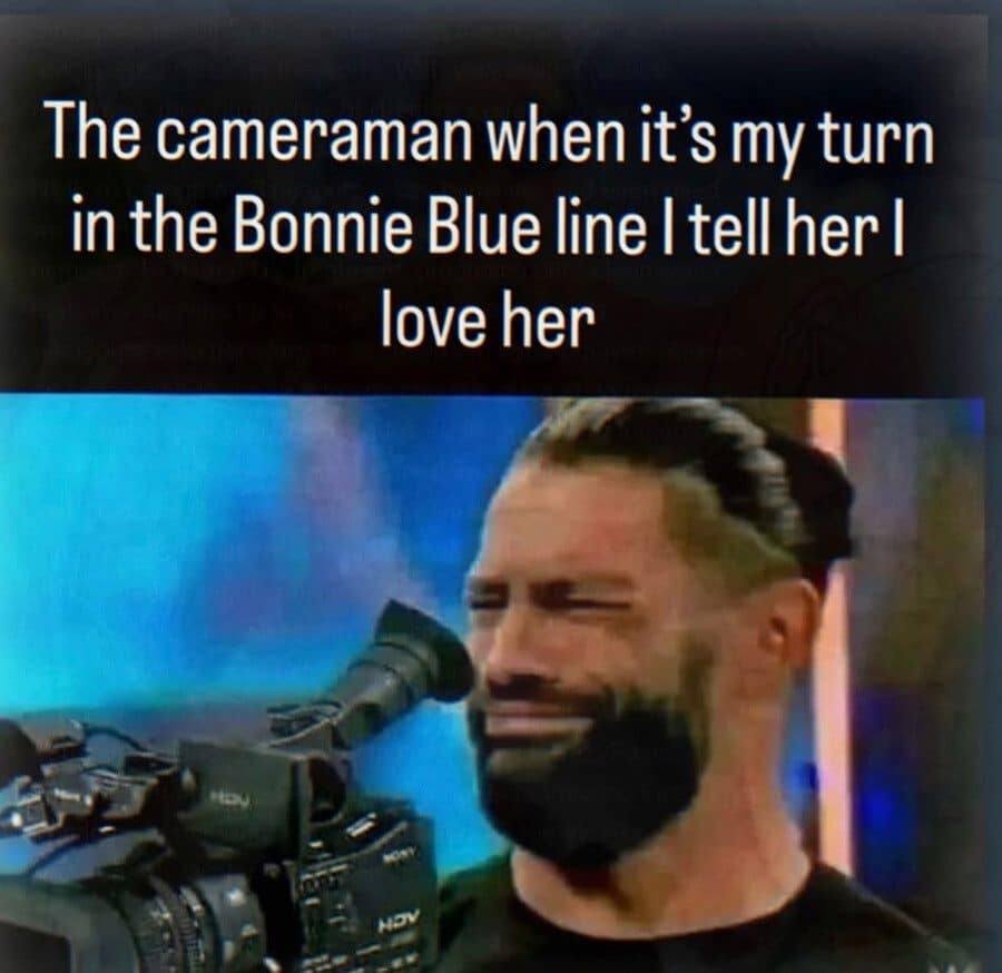 Roman Reigns crying behind a camera in a crude joke about an adult content creator.