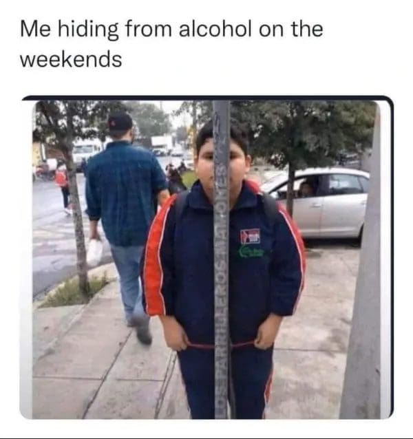 Boy hiding behind a very thin street pole, captioned as avoiding alcohol on weekends.