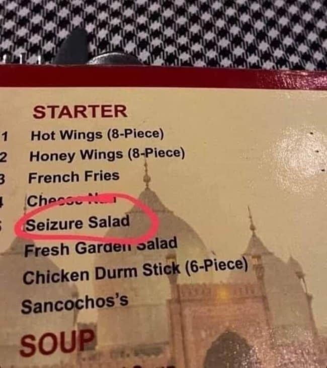 Restaurant menu listing Seizure Salad and Chicken Durm Stick under starters.