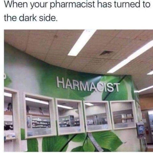 Pharmacy wall sign missing its first letter so it reads HARMACIST.